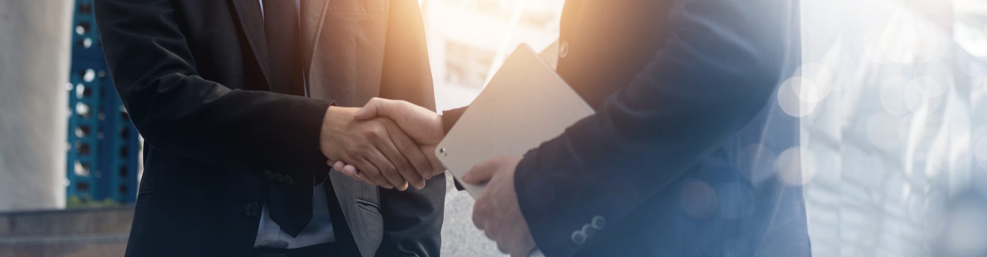 Successful negotiate and achievement concept, two business people shake hand after talk and success in investment deal